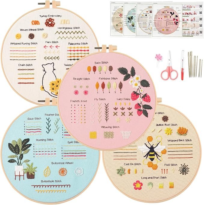 The Embroidery Stitch Practice Kit 5 features five hoops with vibrant floral and plant designs, plus embroidery patterns, scissors, needles, threads, and essential supplies for stitching practice displayed nearby.