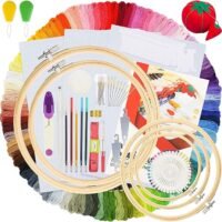 The Hand Embroidery Starter Kit (215 pieces) includes thread skeins, wooden hoops, fabric, needles, scissors, threaders, a pincushion, measuring tape, and more tools—all neatly arranged in a circular layout.