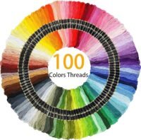 The Hand Embroidery Starter Kit (215 pieces) features 100 embroidery threads arranged in a rainbow spectrum with "100 Colours Threads" at the centre, organised by shade for a vibrant and colourful display.