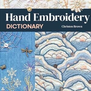 Cover of Hand Embroidery Dictionary by Christen Brown displays cream and blue embroidery designs—flowers, waves, insects, and a spider’s web. The text highlights over 500 stitches and design ideas included in the book.