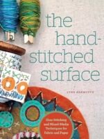 Cover of the book The Hand-Stitched Surface by Lynn Krawczyk, featuring colourful spools of thread, fabric swatches, and an embroidered circular piece, with text about slow stitching and mixed-media techniques.