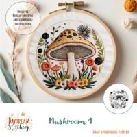 The Mushroom 1: Hand embroidery pattern features a round hoop with a colourful mushroom design, surrounded by flowers, leaves, and stars. Includes thread painting and stumpwork instructions.