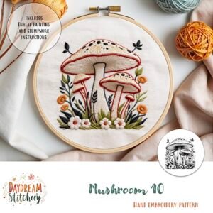 The Mushroom 10: Hand embroidery pattern features two large mushrooms with leaves and flowers on white fabric. Includes thread painting, stumpwork instructions, and is designed by Daydream Stitchery.