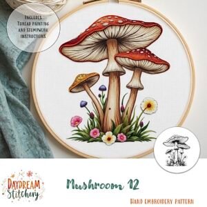 The Mushroom 12: Hand embroidery pattern features three red-capped mushrooms surrounded by colourful flowers and grass in a wooden hoop. Includes instructions, with "Mushroom 12" written below the design.
