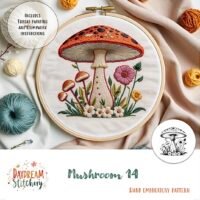 A circular embroidery hoop shows a vibrant stitched mushroom with flowers and grass, surrounded by threads. Text reads: Daydream Stitchery, Mushroom 14: Hand embroidery pattern.