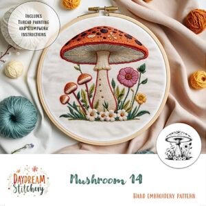 A circular embroidery hoop shows a vibrant stitched mushroom with flowers and grass, surrounded by threads. Text reads: Daydream Stitchery, Mushroom 14: Hand embroidery pattern.