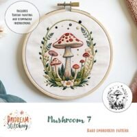 The Mushroom 7: Hand embroidery pattern features red-capped mushrooms, ferns, and stars in a detailed design. The pattern includes instructions for thread painting and stumpwork.