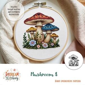 A vibrant hand embroidery pattern featuring red, yellow, and blue mushrooms with green leaves and pink flowers. Displayed on a white surface with "Mushroom 8a: Hand embroidery pattern" text and includes stitching instructions.
