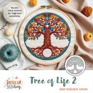 A vibrant Tree of Life 2: Hand embroidery pattern in a wooden hoop, adorned with yarn balls. Includes “Daydream Stitchery” logo and a silver tree medallion.